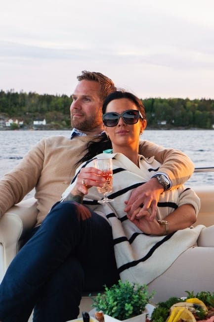 Couples getaway in Telemark The couple enjoys a relaxing cruise on board the electric boat.